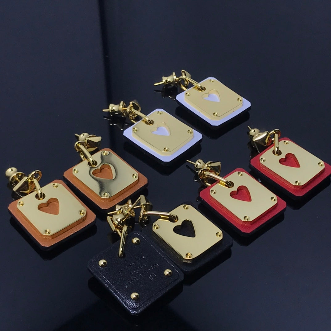 18K As De Celine Black Hermès Earrings